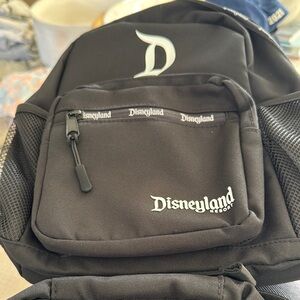 Disney Black  Backpack with Iconic Logo and Durable Design